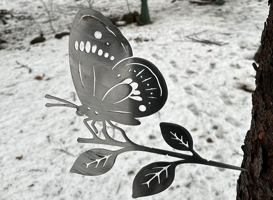 Metal Butterfly on Hammer in Branch